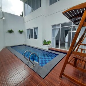 Villa Almira Delapan Bangunan Minimalis